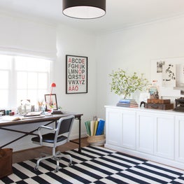 Bright White Office. Black + White + Pop of Red. Striped Rug.