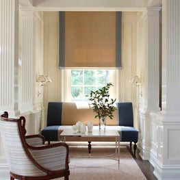 Blue and White Living Room Seating Area with Settee 