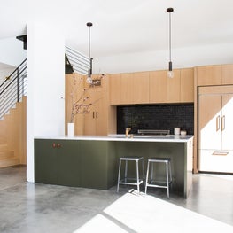 Warm Modern Open Plan with Concrete Floors and Handmade Ceramic Tile