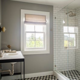 Seattle. Bath with floor tile by Villa Lagoon.