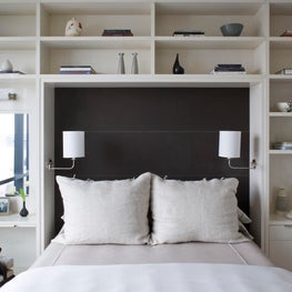NYC Apartment Master Bedroom, upholstered headboard, built in bookshelves