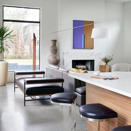 Portfolio: Modern kitchen with black accents and colorful artwork