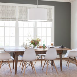 Bright White Dining Room with Charcoal Accent Wall, Seagrass Rug. Nashville. 