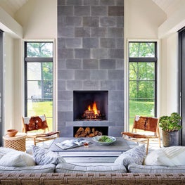 Indoor-Outdoor Living, Three-Seasons Room, Retractable Glass Walls, Wood-burning Fireplace, Cowhide Chairs, Grey Stone - Glencoe Contemporary Project