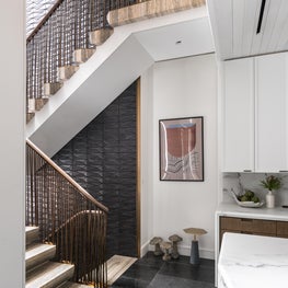 Upper East Side Townhouse, Kitchen and Stair in travertine and bronze
