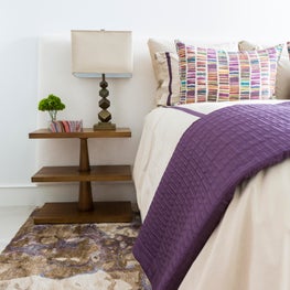 Portfolio: Neutral bedroom with pops of purple, pattern, and texture in Woodlands home
