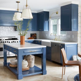 Eclectic Traditional Kitchen with Zellige Backsplash and Navy Cabinets