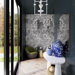 Modern LA Entry in bold wallpaper, dark walls makes a stunning first impression.