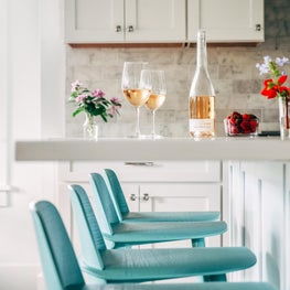 Clean White Beach House Kitchen with Pop of Turquoise in Anna Maria, Florida 