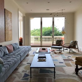 Living Room with custom terrazzo patterned flatweave rug