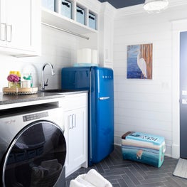 Laundry room with navy ceiling in an Avalon, NJ  beach house