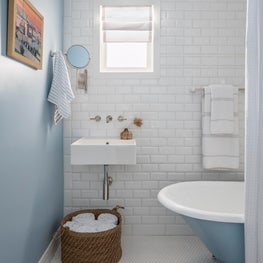 Cheerful Blue Bathroom with Petite Clawfoot Tub