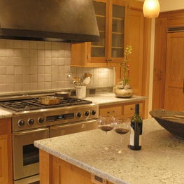 Woodside Family - Kitchen: cast bronze details, hand hewn steel/bronze hood, artisan tile