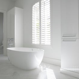 Bathroom / Contemporary bathroom in French chic renovation