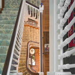 Traditional Boston townhouse renovation, staircase with carpet