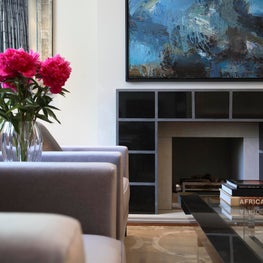 Luxury reception room with bespoke fireplace surround