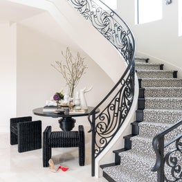 Portfolio: Glamorous grand entrance to beautiful, luxurious staircase and seating area