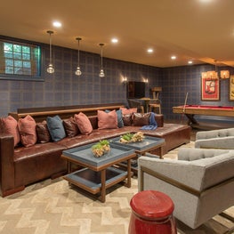 New England suburb, basement lounge with Nail head wall paper