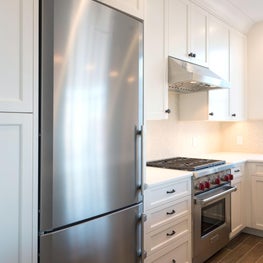 Open White Kitchen with Custom Cabinetry