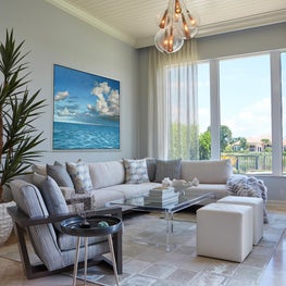 Elegant Golf Manor Sitting Room - Family Room overlooking golf course. Custom light fixture, bold art, faux fur throw, luxurious fabrics.