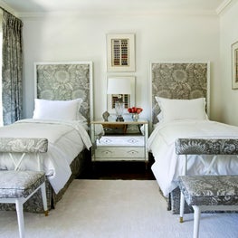 At Home guest bedroom with two twin beds