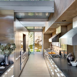 Indoor outdoor kitchen with Bulthaup cabinets