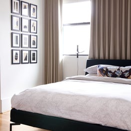 Portfolio: Modern guest room with contemporary art wall featuring the works of Josh Young