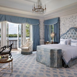Delicate plaster detailing and hand painted silk walls in Palm Beach