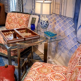 Designer House - Custom chairs with stacked cushions in batik fabric and fringe