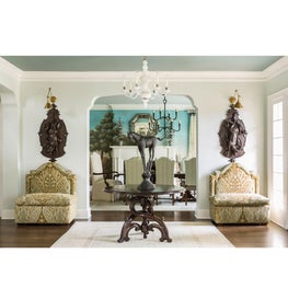 Foyer with German wall sculpture, custom GDG banquets, and Corbin Bronze statue