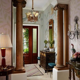 An artisan created a tone-on-tone Trompe l’oeil pattern for this entry hall.