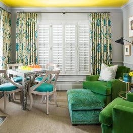 Sunny Sitting Room with Yellow Ceiling and Green and Turquoise Upholstery 