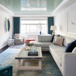 Upper East Side Living Room with green lacquered ceiling and salmon pink pouf