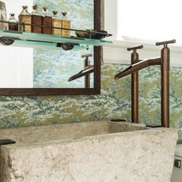 Mud room with sink made from 18th century horse trough and copper fittings