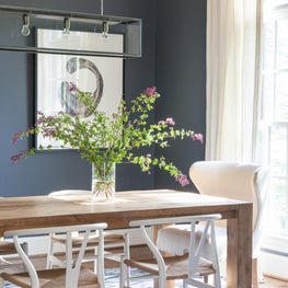 Dining Room: Wishbone Chairs, Geometric Rug, White Panel Drapes, Rustic Table