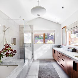 Master Bath with subtle gray-green veined quartzite surfaces