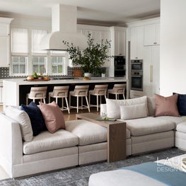 For this open-concept family room and kitchen, we prioritized plenty of seating opportunities to make hosting a breeze!