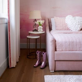 Perfect pink layers make this little girl's bedroom a whimsical space for play.