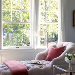 A Tufted Chaise and Accents