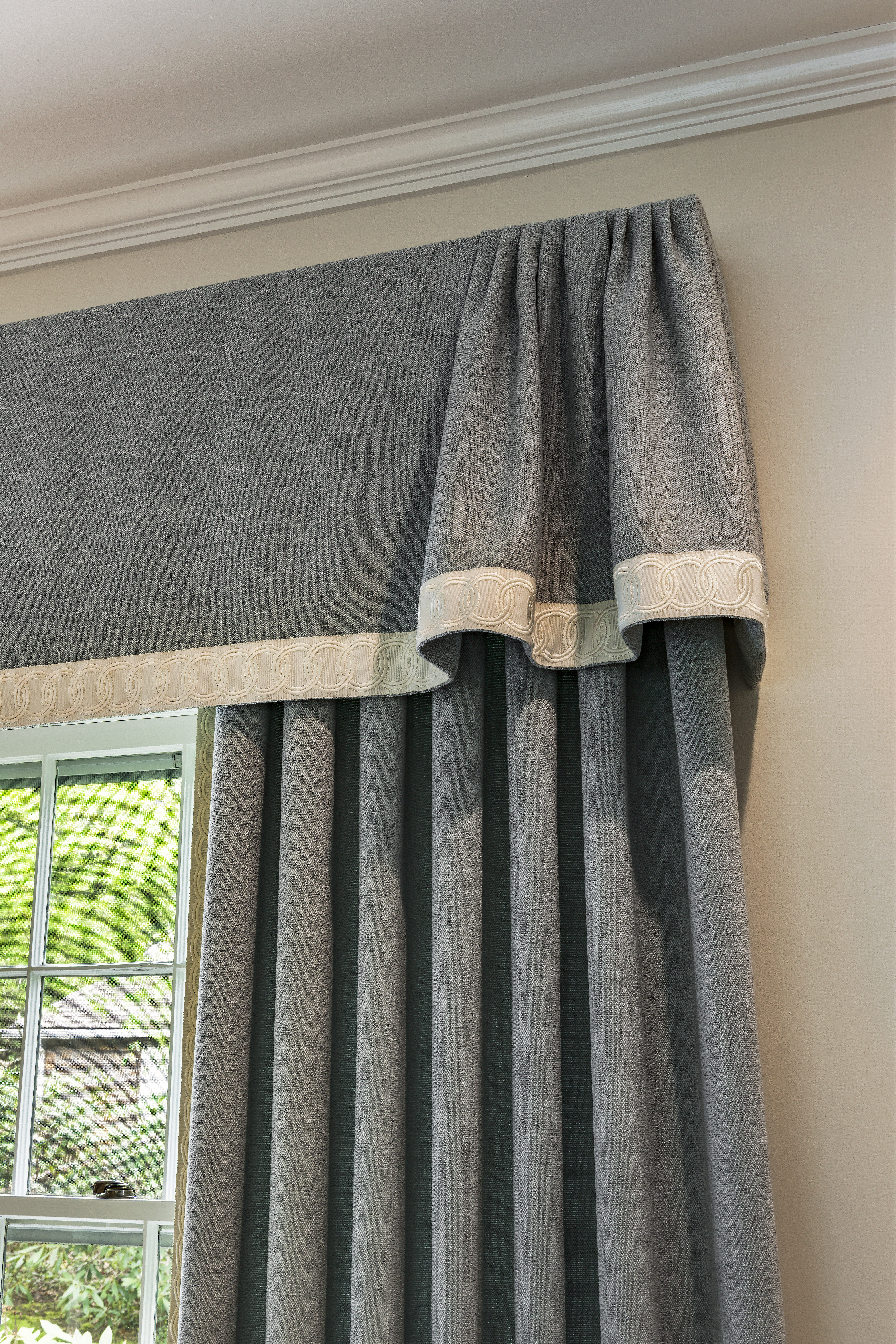Details along the leading edge of a classic linen window treatment on Main Line