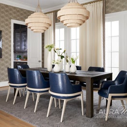 Layers of texture create an inviting atmosphere in this dining room. Blue leather adds a touch of bold sophistication.