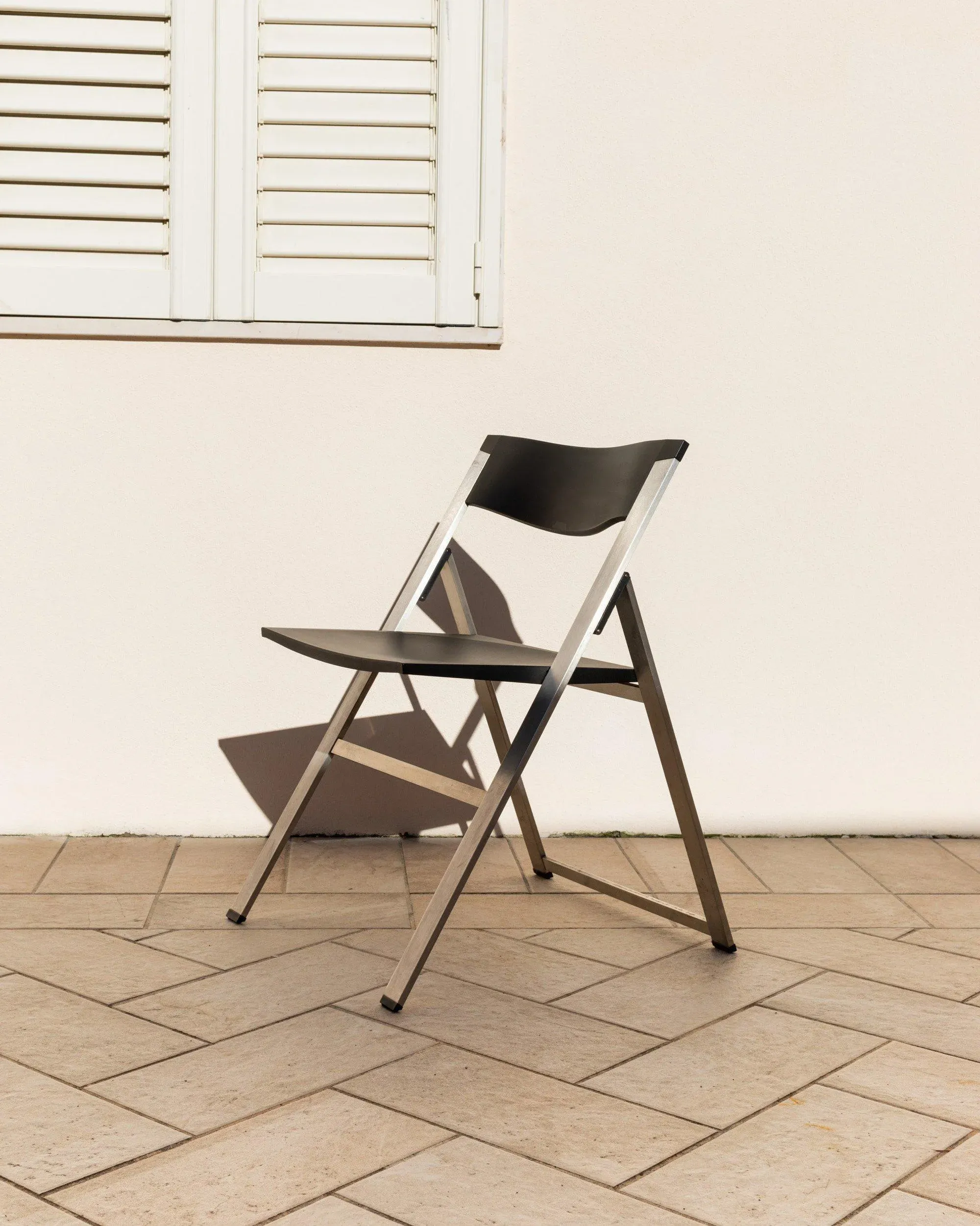 Steel and Black Plastic Folding Chair P08 by Justus Kolberg for Tecno, Italy, 1990s