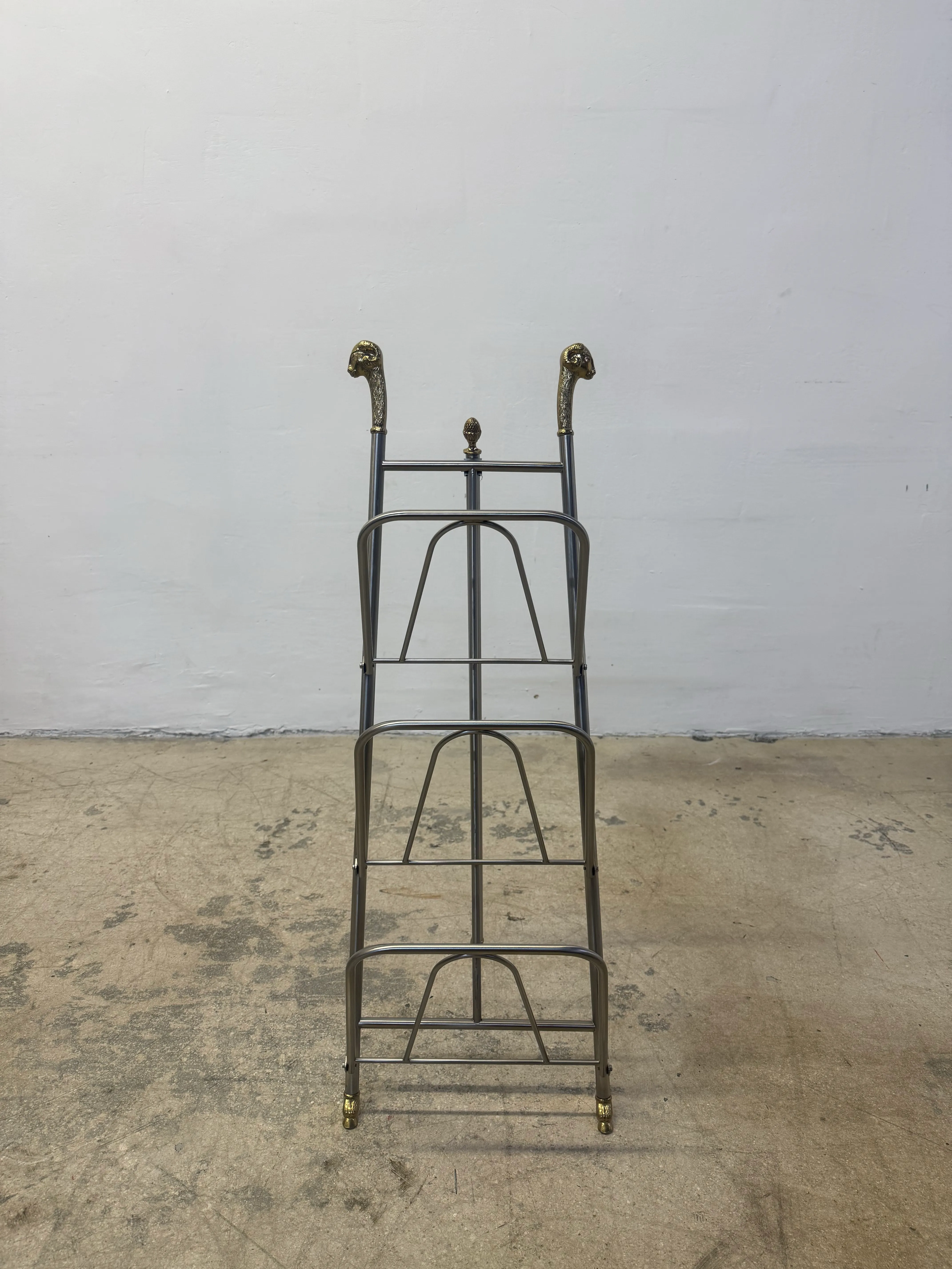 Maison Jansen Style Steel and Brass Rams Head and Feet Magazine Rack, Italy