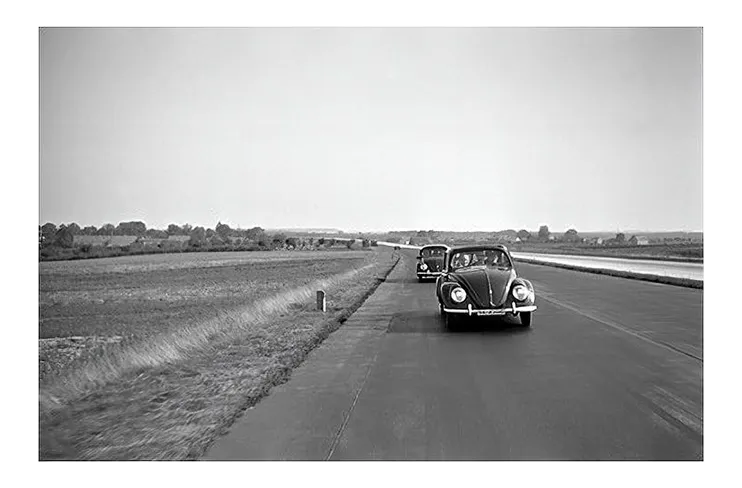 Two Volkswagen Beetles on the Highway, Germany, 1938 main image 3