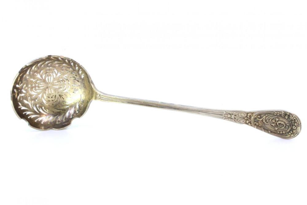 Silver Dusting Spoon with Scalloped Edges and Raised Handle