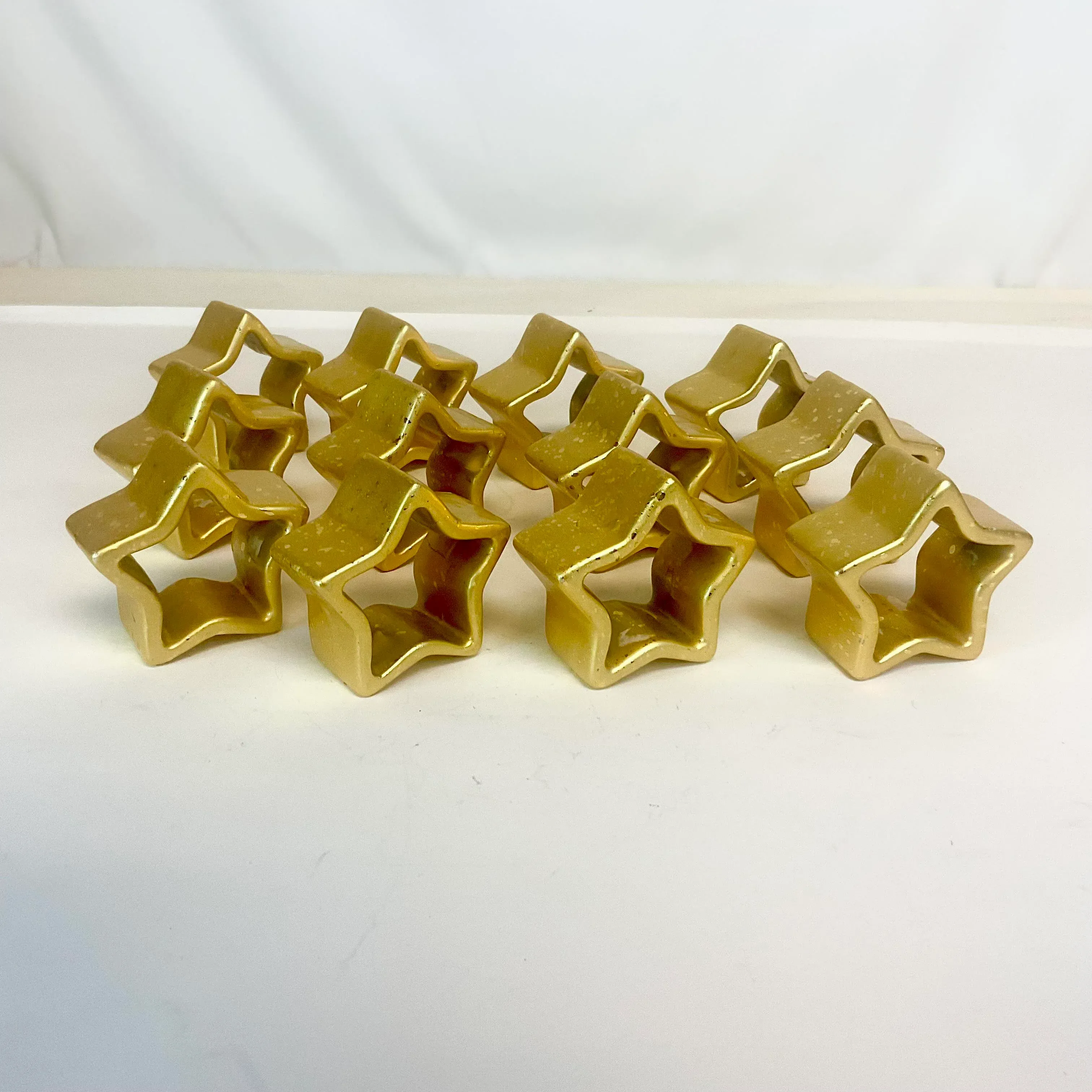 1980s Postmodern Hollywood Regency Ceramic Star Napkin Rings - Set of 12