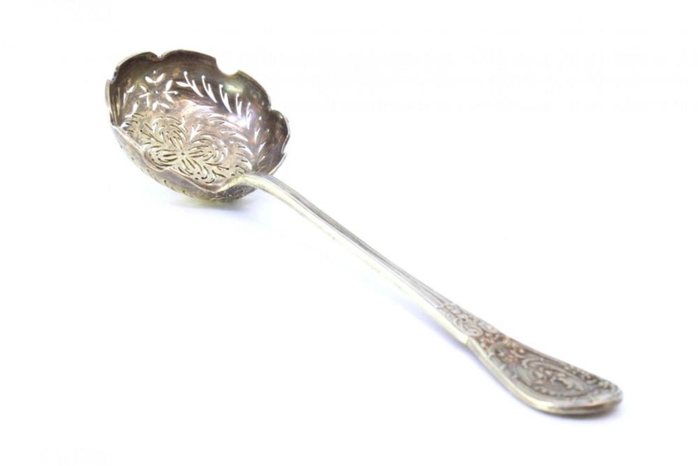 Silver Dusting Spoon with Scalloped Edges and Raised Handle