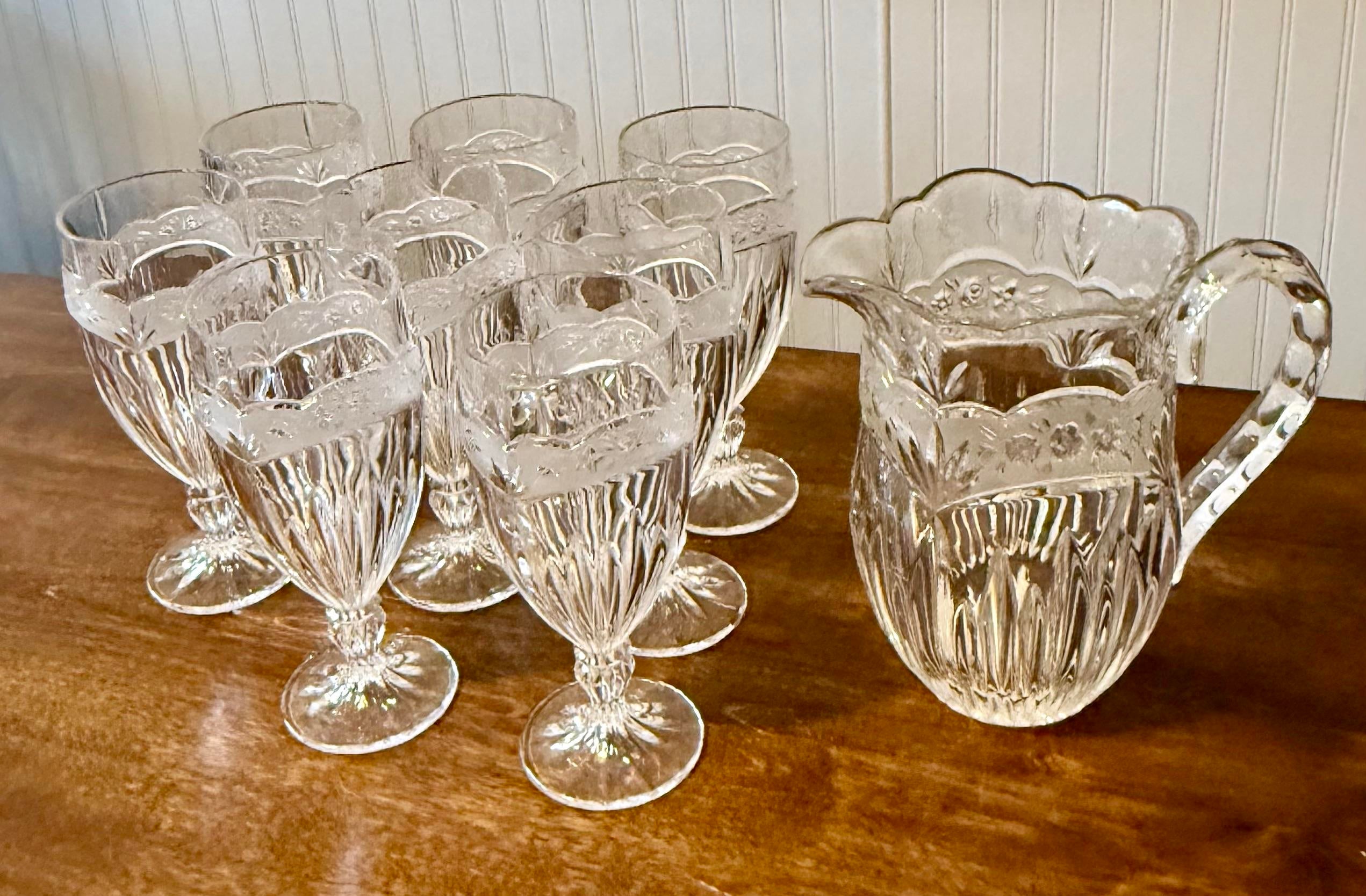 Late 20th Century Oneida “Southern Garden” Set of Pitcher and Eight Glasses - 9pcs