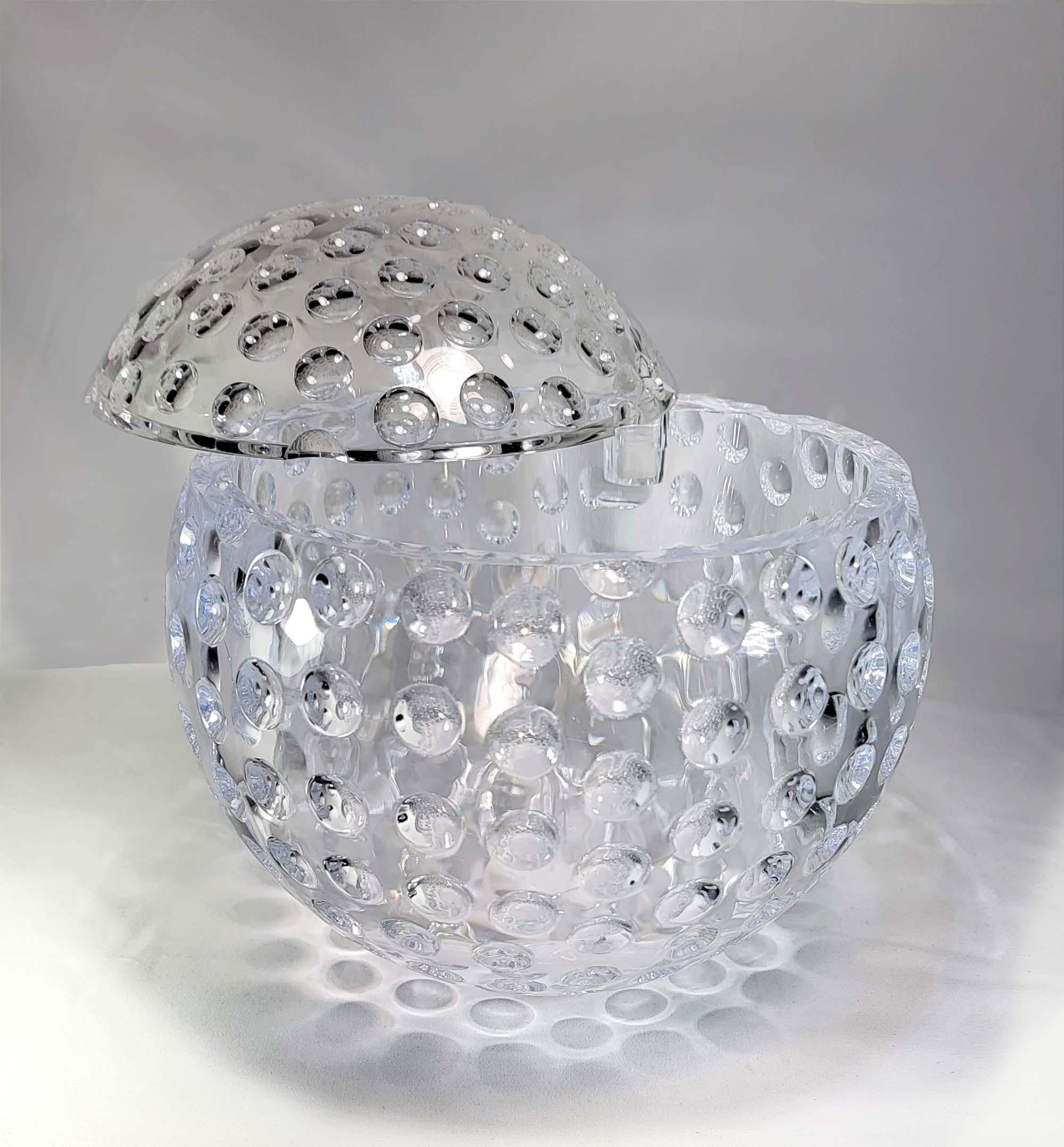 https://chairish-prod.freetls.fastly.net/image/product/master/1622de28-331d-4515-8296-7ede1b8205ef/mid-20th-century-grainware-lucite-golfball-ice-bucket-5380