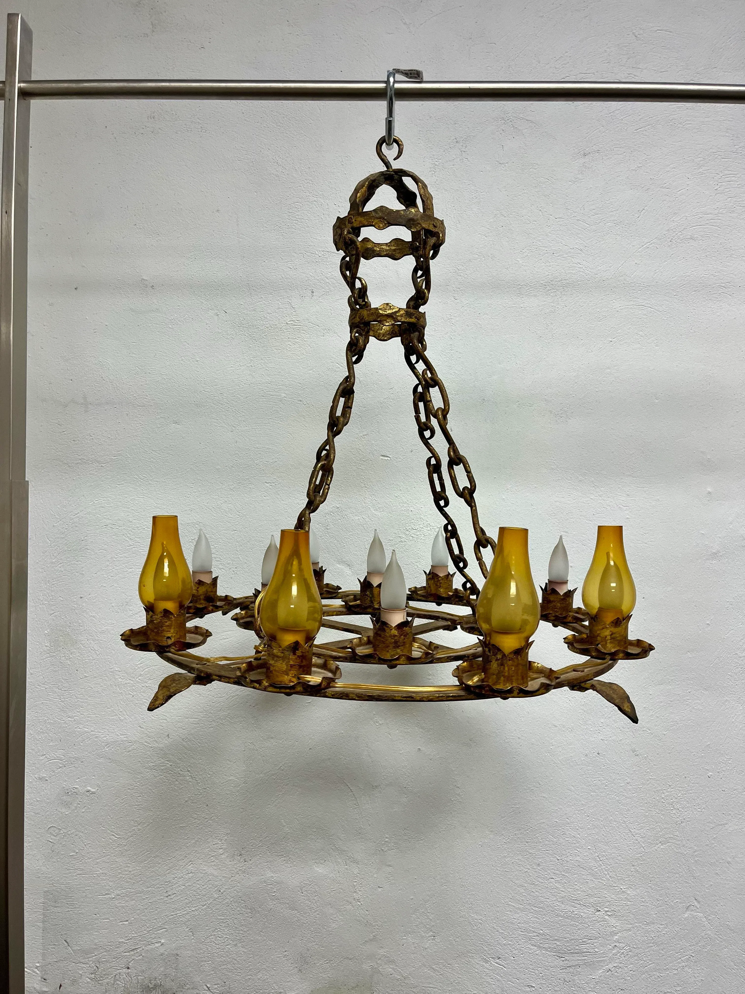 Antique French Brutalist Gilt Forged Iron 12-Light Chandelier is